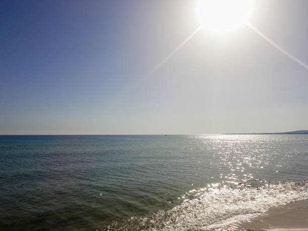 White pebbles in Le Saline beach in Sardinia, Italy