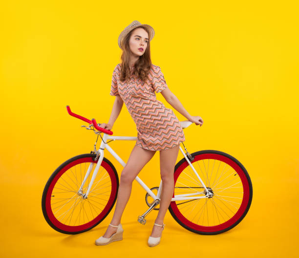istock Confident stylish girl with retro bicycle 817449592