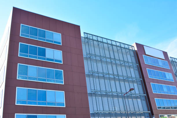 istock Modern red building with glass windows 817456182