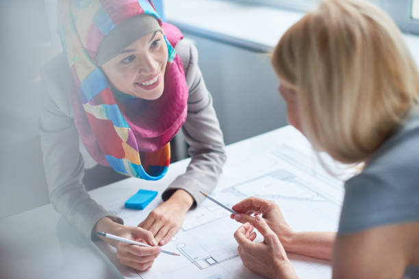 istock Designing building with Arab colleague 817456220