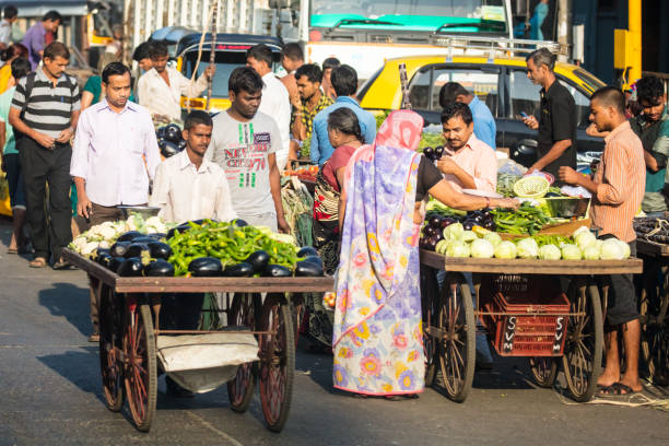 MUMBAI, INDIA - November 11 2017: Street sellers selling vegetables in Mumbai, India
