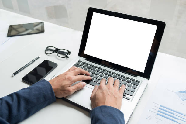 istock Professional businessman working at his office with laptop and smartphone, work process concept. 817466948