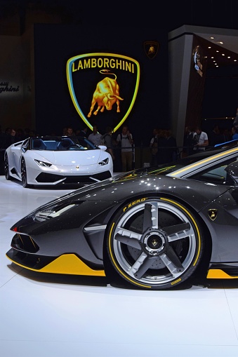 Geneva, Switzerland - March, 1st, 2016: Lamborghini cars on the motor show. On the first plan we see the Lamborghini Centenario. These vehicles are one of the most wanted and expensive cars in the world.