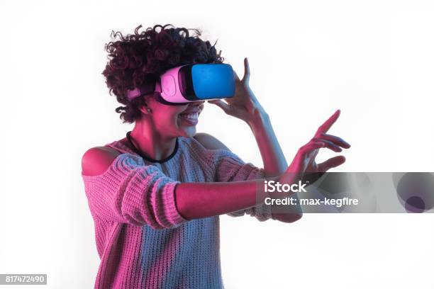 Woman Adjusting Vr Headset And Touching Air Stock Photo - Download Image Now - Virtual Reality Simulator, Virtual Reality, Women