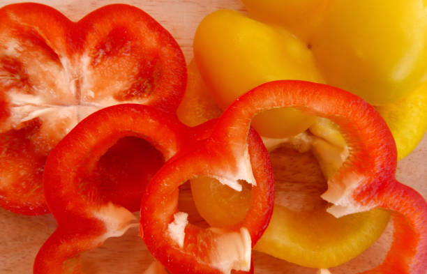 istock Sliced Red and Yellow Peppers 817492794
