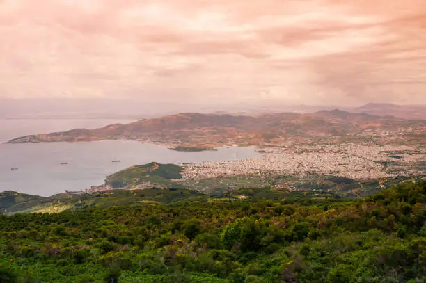 Panorama of the Greek city of Volos at sunset. Volos in Greece. View from the mountain on the Volos