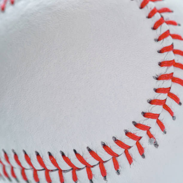 istock Close up of a baseball threads with copy space background 817514536
