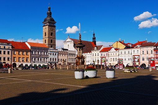 Ceske Budejovice, Czech Republic - July 05, 2016: Central town square with Samson fighting the lion fountain sculpture and bell tower