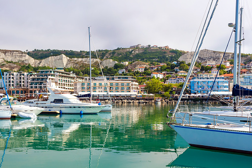 Anchored boats and yachts at marina on lake of Geneva, Switzerland.