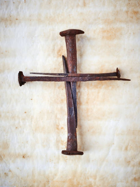 Cross made of Rusty Nails Cross made of Rusty Antique Handmade Square Nails rusty nails stock pictures, royalty-free photos & images