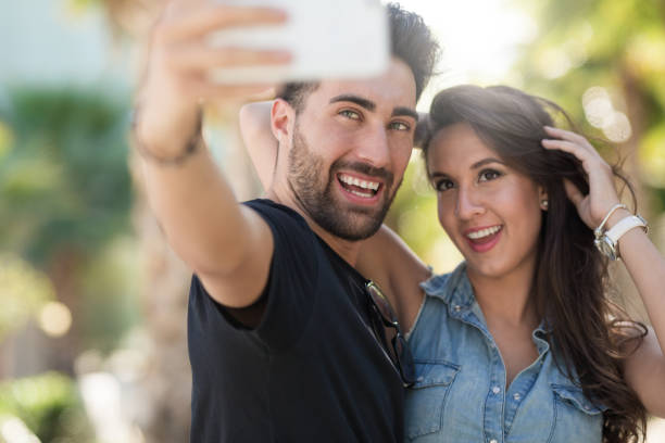 istock Happy couple taking selfie together 817537890