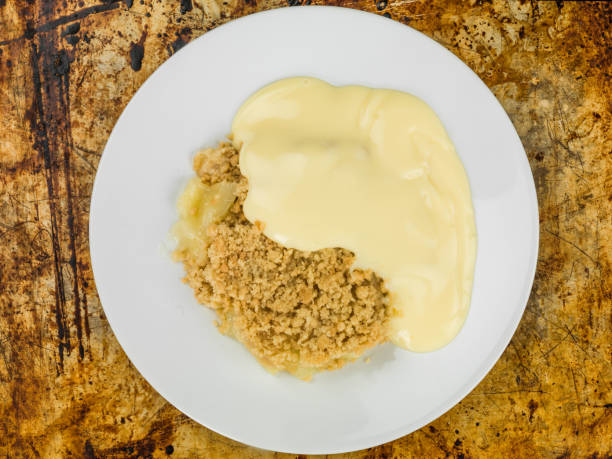 istock Apple Crumble Dessert Served With Custard 817584574