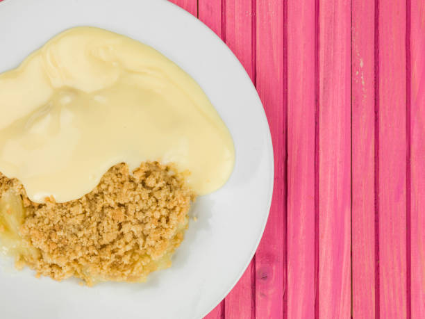 istock Apple Crumble Dessert Served With Hot Custard 817584584