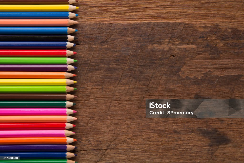 Group of colorful pencils on the wood table  background artwork gallery equipment tool concept Art Stock Photo