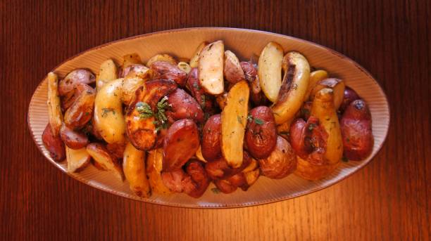 tasty roasted potatoes stock photo