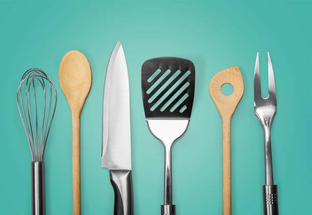 Spatula. Kitchen metal and wooden utensil on  background cooking utensil stock pictures, royalty-free photos & images
