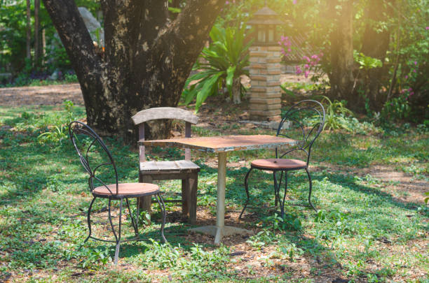 istock table chair wooden set in garden for relax. 817606372
