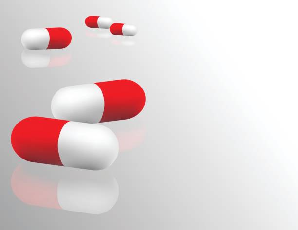 istock red and white drug capsule on reflex glass concept medicine 817616276
