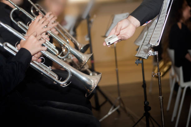 istock Playing trumpets, tuning, classical music. 817616338