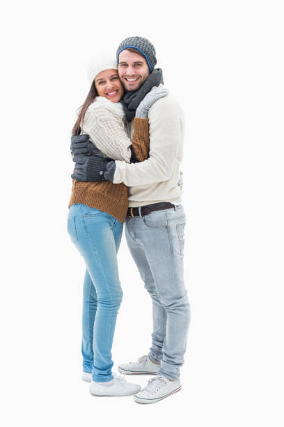 istock Attractive young couple in warm clothes hugging 817620414