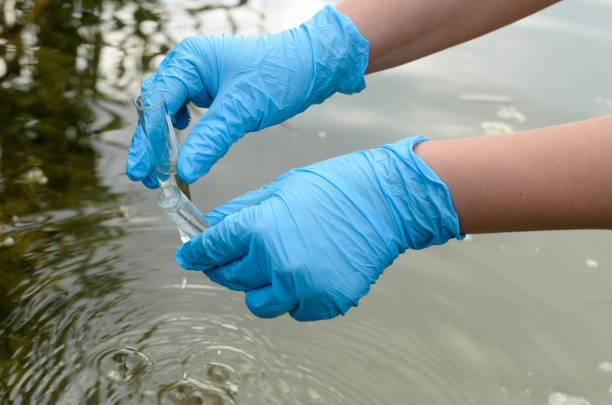istock Taking a water test for analysis from a reservoir. 817640336