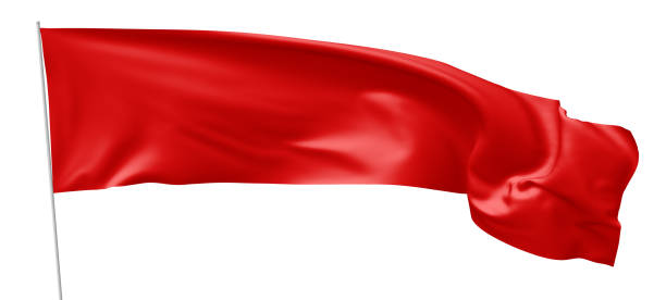 istock Long red flag on flagpole waving in wind 817640930