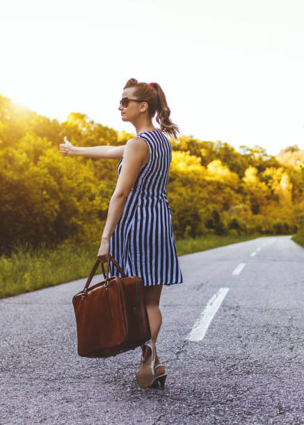istock Young woman on a road trip 817648710