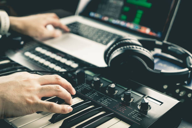 Music producer is recording sound on Computer stock photo