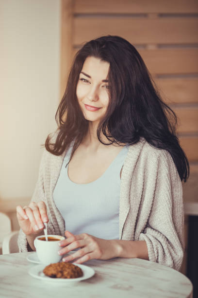 istock Romantic woman in cafe 817673348
