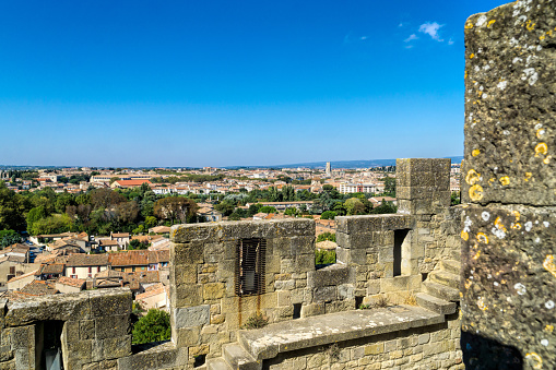 Toledo cityscape with Alcantara bridge (Puente de Alcantara) over Targus river. Spain