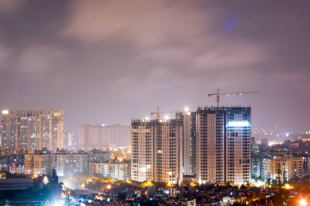istock Skyscraper being built in the middle of city 817688894