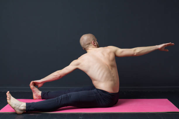 istock Young man  is doing a tilt to the toes 817697718