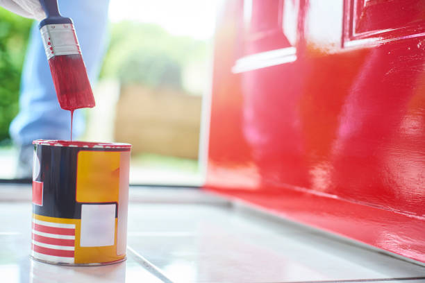 Homeowner gives his front door a new bold lick of paint