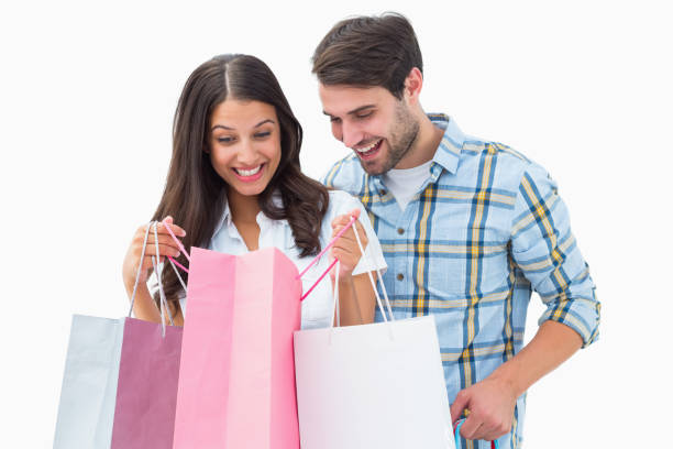istock Attractive young couple with shopping bags 817718746