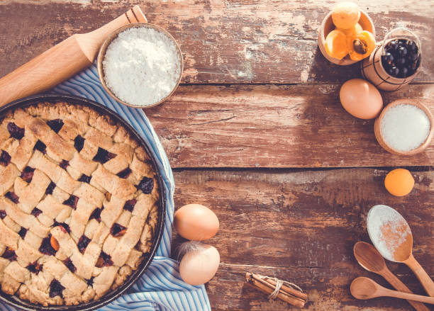 istock Black currant and apricot pie with ingredients 817724438