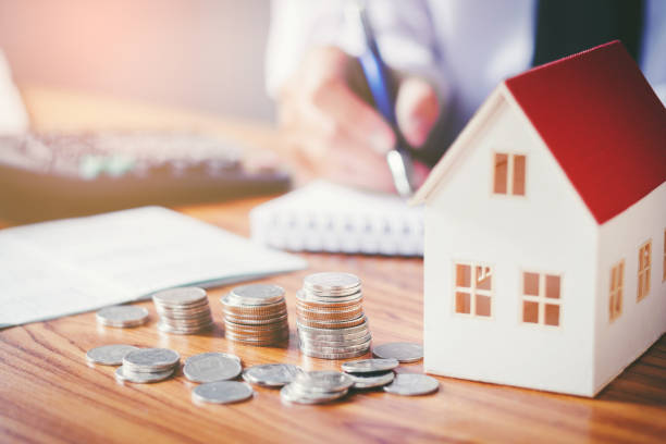 ahorrar dinero para la casa costo - interest rate house loan budget fotografías e imágenes de stock