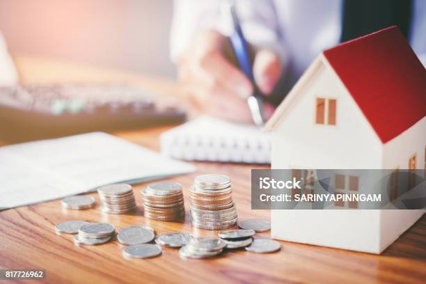 Save Money For Home Cost Stock Photo - Download Image Now - House, Currency, Mortgage Loan