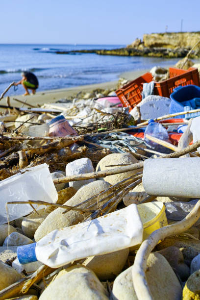 istock Great environmental and ecological problem, waste and rubbish in world ocean water and on the beach 817741902