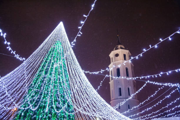 istock Christmas tree with decoration installed in Vilnius Cathedral Square in Lithuania at night during Christmas holidays 817746518