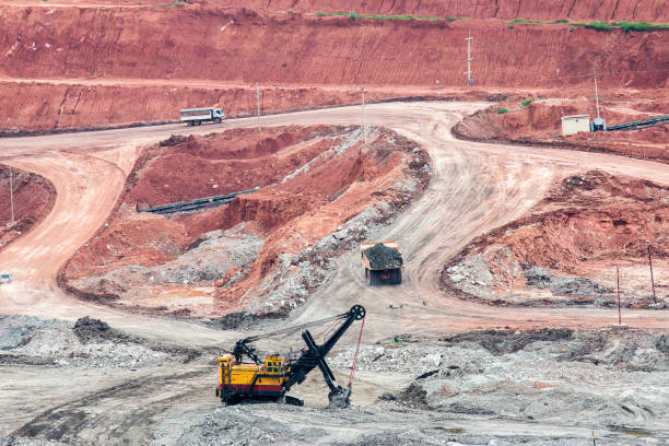 istock Part of a pit with big mining truck working 817772338