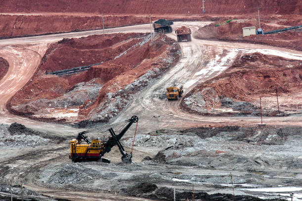 istock Part of a pit with big mining truck working 817772402