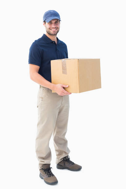 feliz hombre sosteniendo la caja de cartón de entrega - box men holding isolated fotografías e imágenes de stock