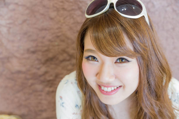 istock woman with a cute smile 817802896