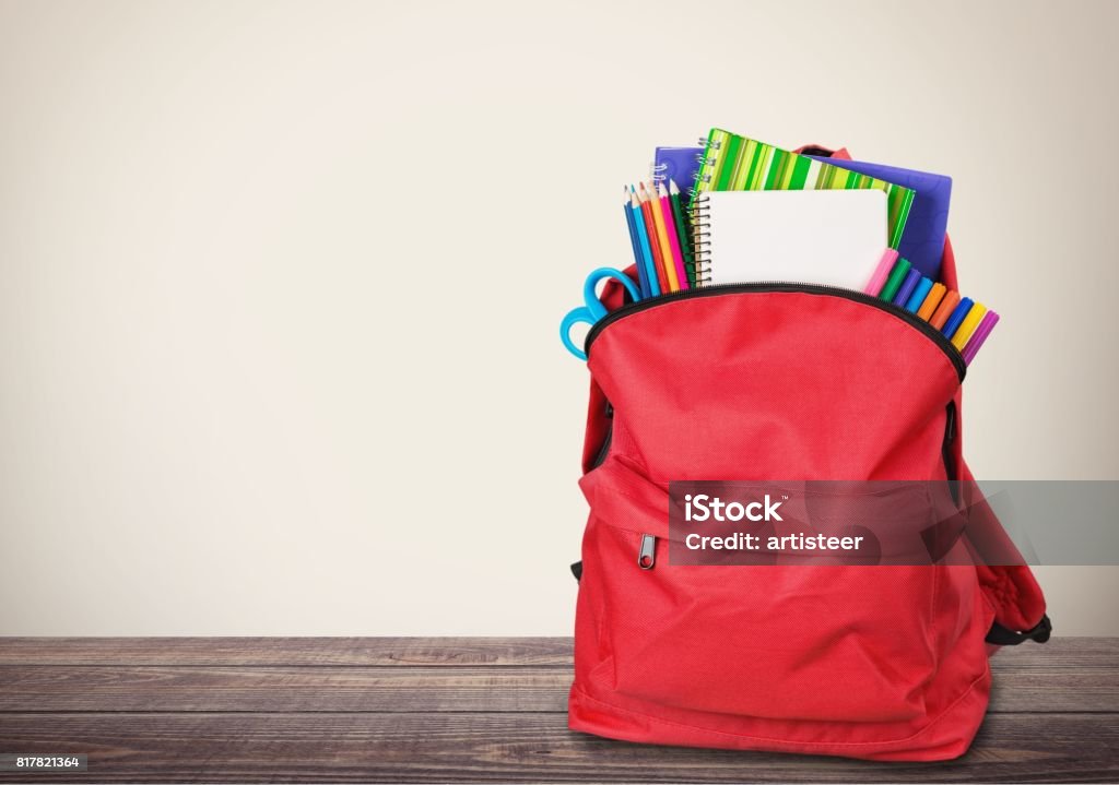 School. Red School Backpack on background. School Supplies Stock Photo