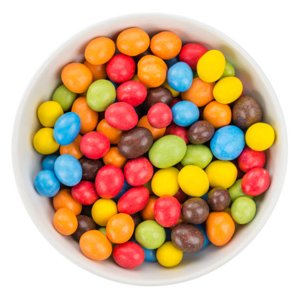 istock Portion of Cocolate coated Peanuts isolated on white 817831632