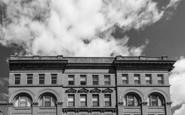 istock Big city building on a cloudy day 817832412