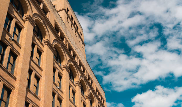 istock Big city building on a cloudy day 817832508