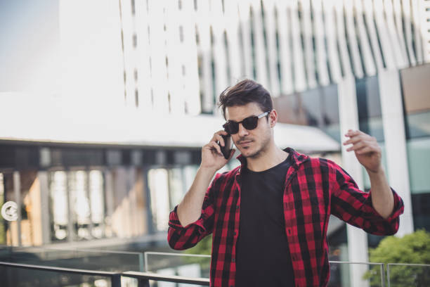 istock Hipster on the phone 817833912