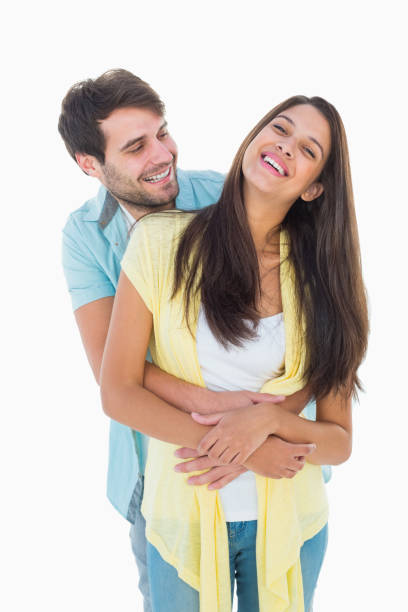 istock Happy casual couple smiling and hugging 817834082