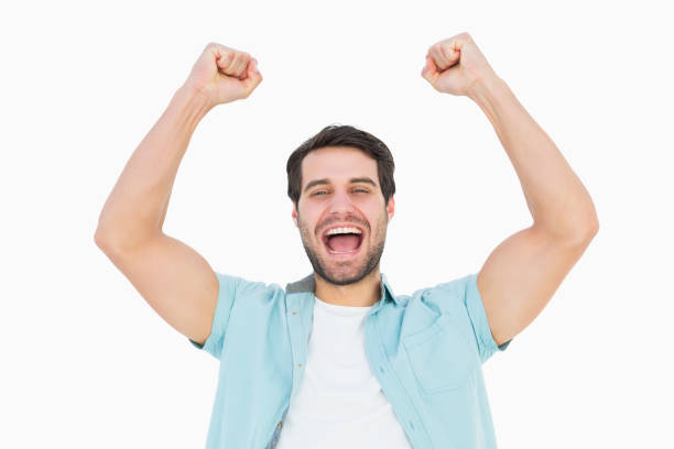 istock Happy casual man cheering at camera 817838816